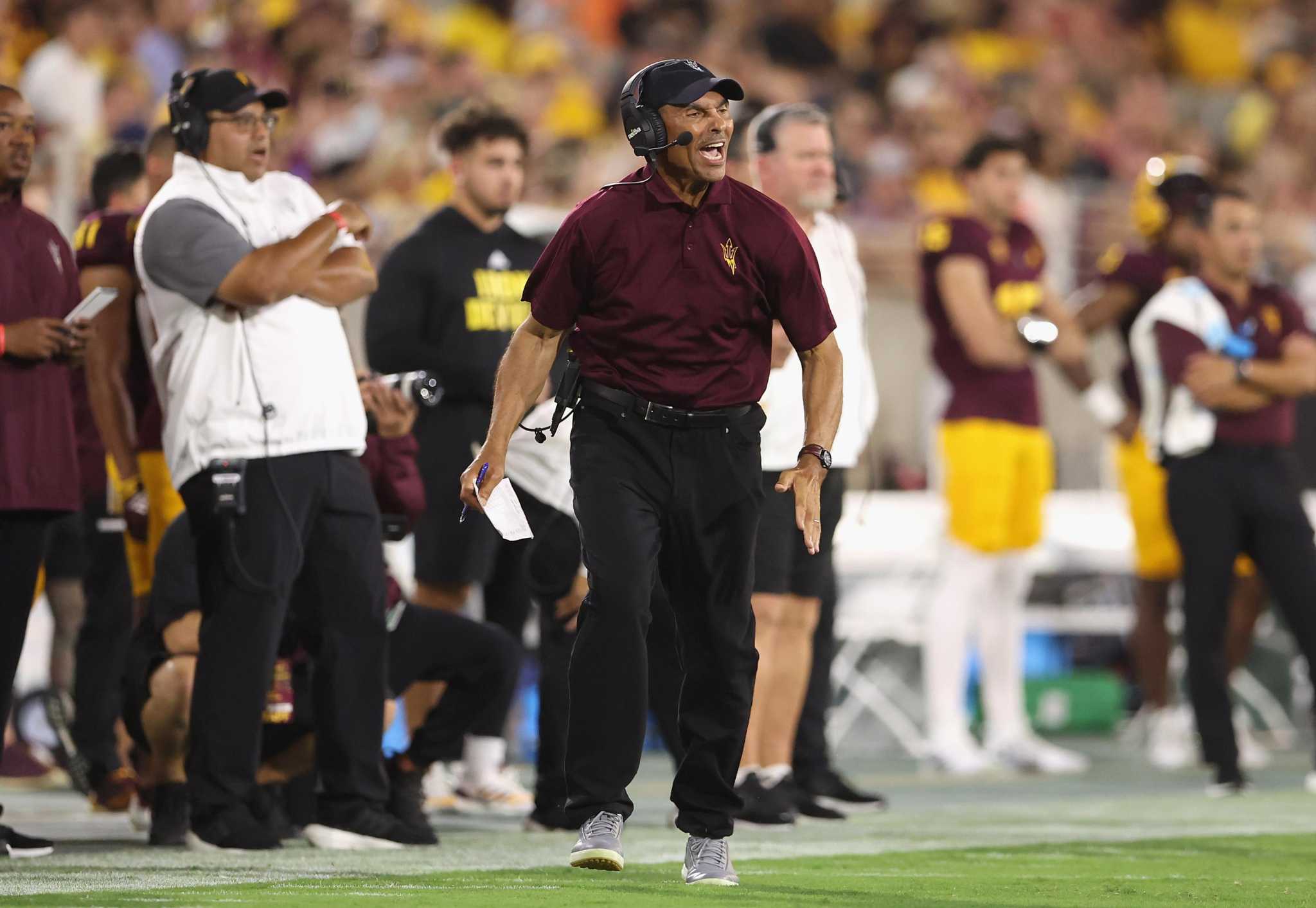 College football notes: Arizona State fires coach Herm Edwards