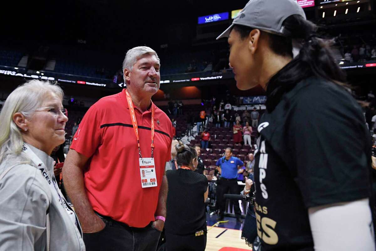 Bill Laimbeer congratulates Las Vegas Aces' A'ja Wilson, right, after her team's win in the WNBA basketball finals against the Connecticut Sun, Sunday, Sept. 18, 2022, in Uncasville, Conn.