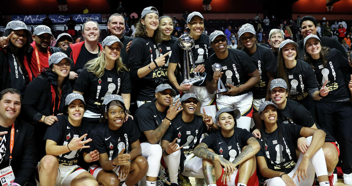 The Las Vegas Aces celebrate defeating the Connecticut Sun 78-71 in game four to win the 2022 WNBA Finals at Mohegan Sun Arena on September 18, 2022 in Uncasville, Connecticut. (Photo by Maddie Meyer/Getty Images)