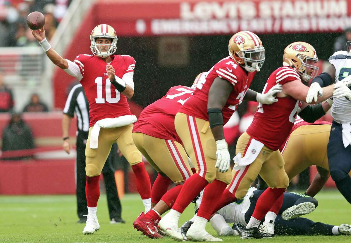 San Francisco 49ers’ Jimmy Garoppolo passes in 3rd quarter against Seattle Seahawks during Niners’ 27-7 win in NFL game at Levi’s Stadium in Santa Clara, Calif., on Sunday, September 18, 2022.