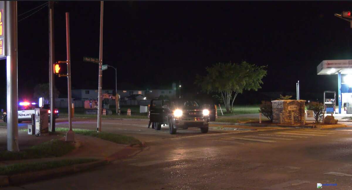 The black GMC truck that two men were driving when they stopped for help after being shot in the chest, HPD said.