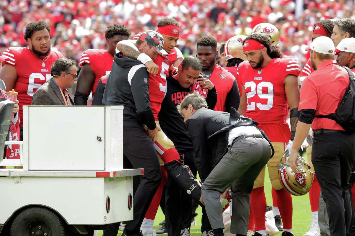 Santa Clara, United States. 27th Sep, 2021. San Francisco 49ers quarterback  Trey Lance (5) runs for a yard against the Green Bay Packers at Levi's  Stadium in Santa Clara, California on Sunday