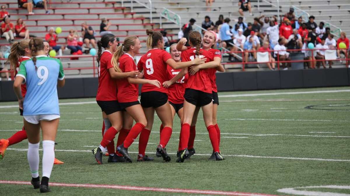 The SIUE women's soccer team celebrates a 2-0 win over SEMO on Sunday.