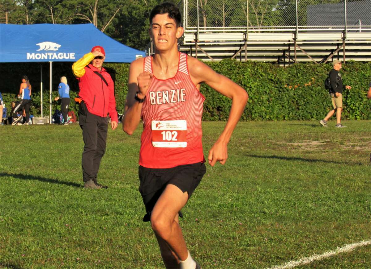 Benzie Central's Pol Molins dashes down the straightaway during the Pete Moss Invitational on Aug. 27 at Benzie Central High School. 