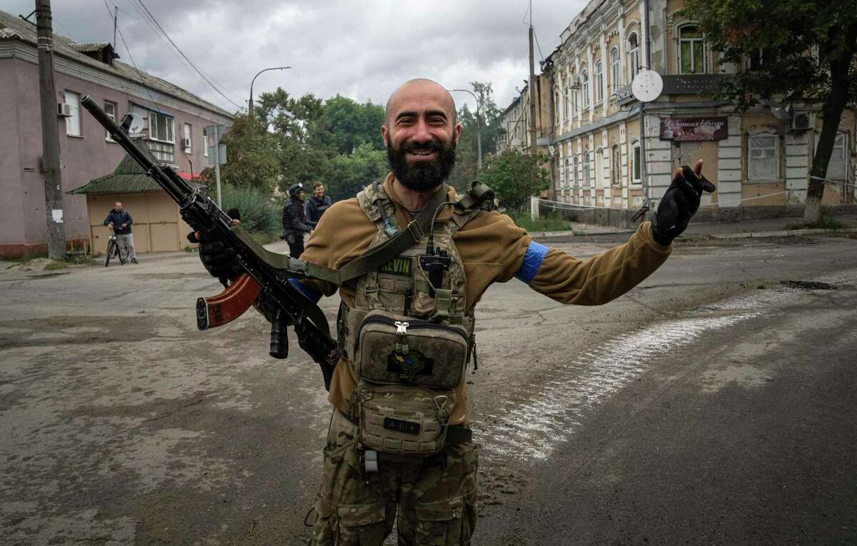 Ukrainian paratrooper Andrii Bashtovyi reacts as he see his comrades in the recently retaken area of Izium, Ukraine, Wednesday. Inspiring millions throughout the world, Ukraine has shown remarkable fortitude.