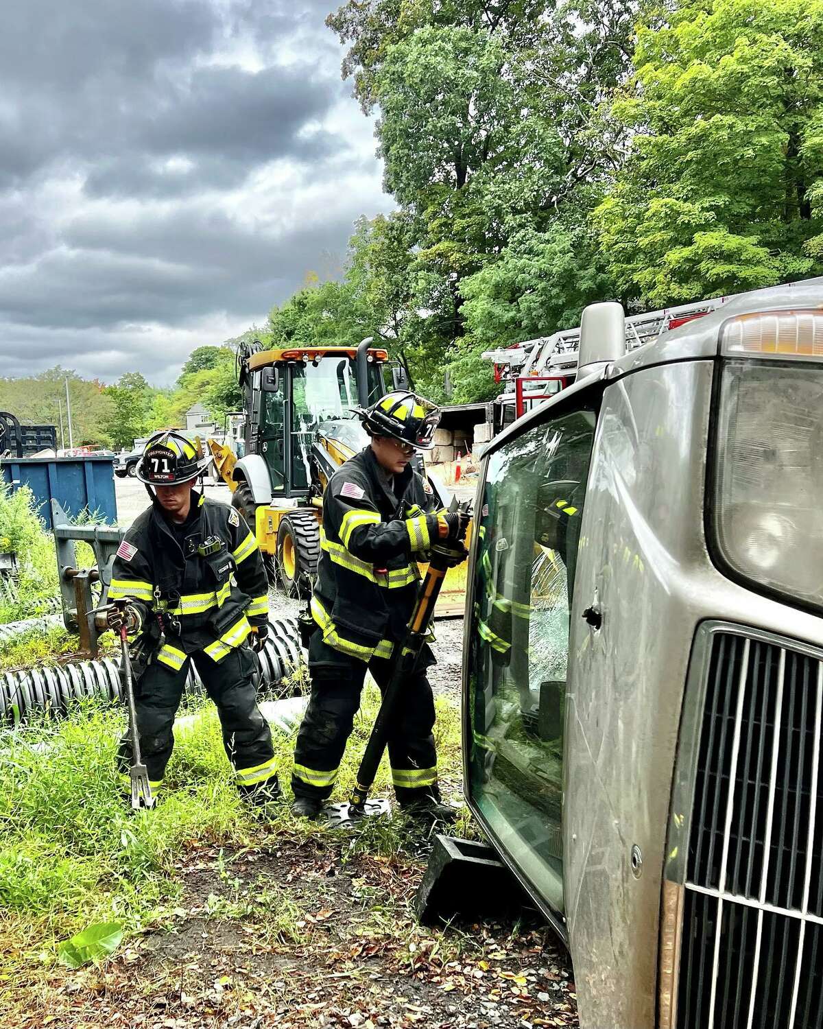 New firefighters Mike Baumblatt and Zach Terenzio training for their roles in the department.