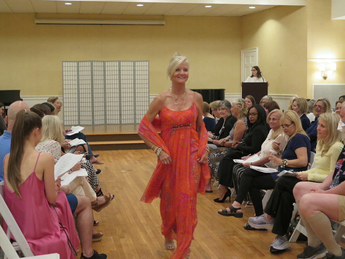 Holly Hard models a vintage Elizabeth Arden gown.