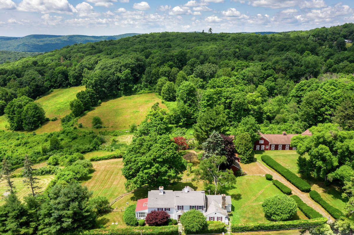 The 232-acre Lost Acre Farm in Warren, Conn. was previously owned by Oliver Newberry Brooks, the founder of industrial company, Brooks and Perkins. The property includes two main houses, a guest house and a guest cottage, as well as horse stables and paddocks.