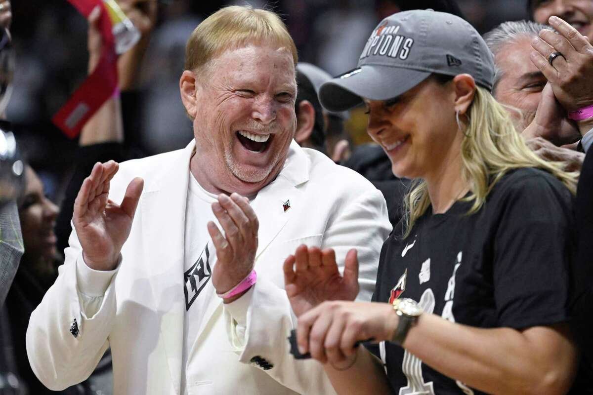 Las Vegas Aces owner Mark Davis celebrates with head coach Becky Hammon in the team's WNBA Finals victory over the Connecticut Sun on Sunday in Uncasville, Conn.