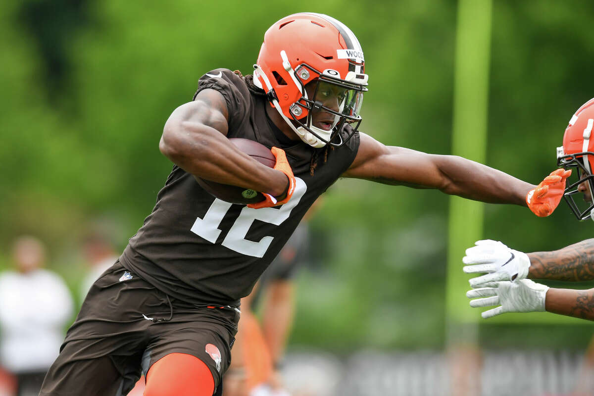 Cleveland Browns wide receiver Michael Woods II (12) runs up the