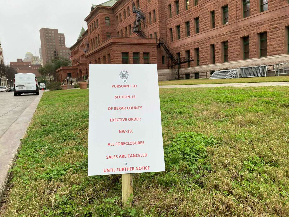 A sign posted last year on the Bexar County Courthouse lawn said that foreclosure sales had been canceled. Since then, such foreclosure auctions have resumed as homeowners are finding it more difficult to sell.