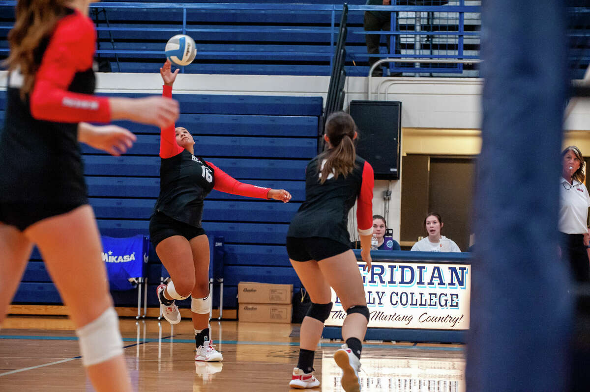Beaverton's Leiyah Mungin attacks during a Sept. 19, 2022 match against Meridian. Mungin had 29 kills, 36 assists, 20 digs, and 13 aces Saturday to lead the Beavers to the championship of the Pinconning Invitational.