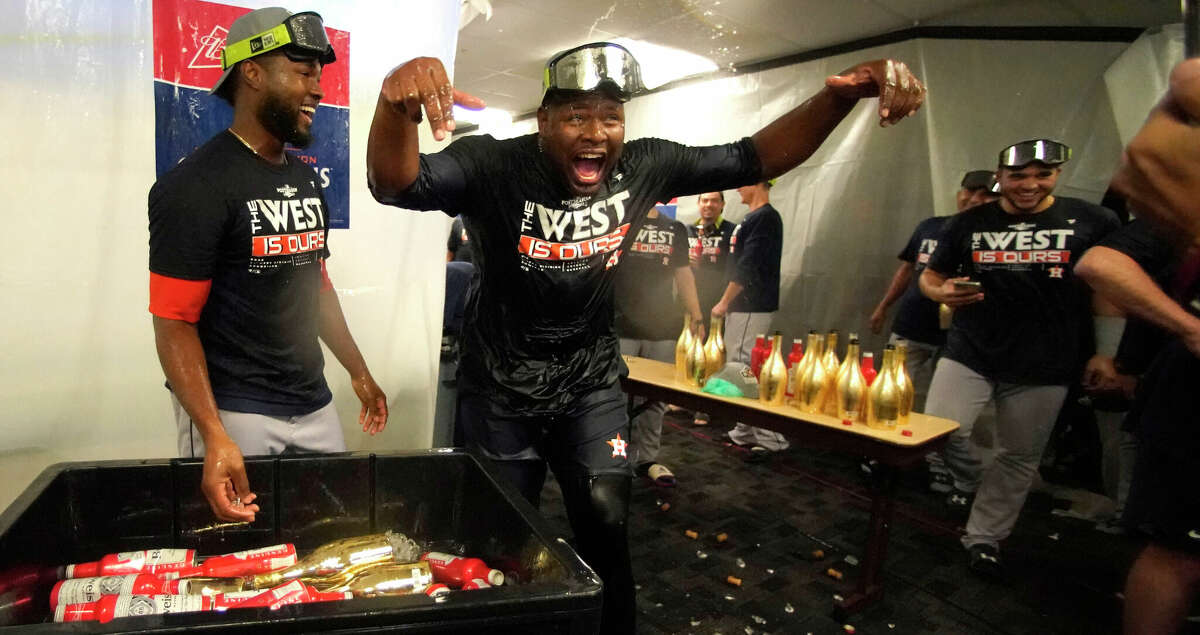 Houston Astros relief pitcher Hector Neris and Houston Astros starting pitcher Cristian Javier (53) after they clinched the AL West after beating the Tampa Bay Rays of an MLB baseball game at Tropicana Field on Monday, Sept. 19, 2022 in St. Petersburg.
