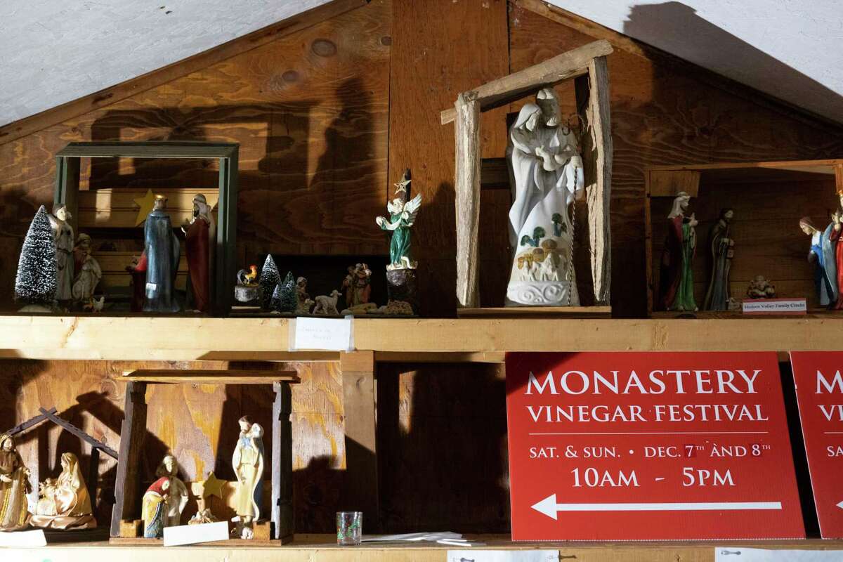 Signage for the Monastery Vinegar Festival sits on a shelf in a gift shop at Our Lady of the Resurrection Monastery.