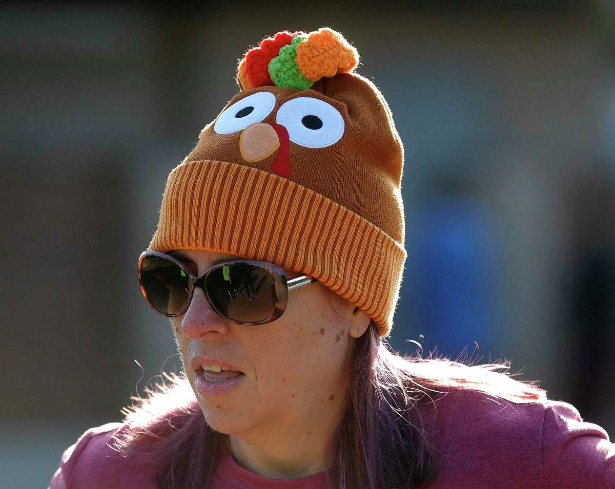Kim Svatek wears a turkey-themed hat before Conroe’s annual Turkey Trot at Carl Barton, Jr. Park, Nov. 20, 2021. This year’s Turkey Trot is set for Saturday, Nov. 19.