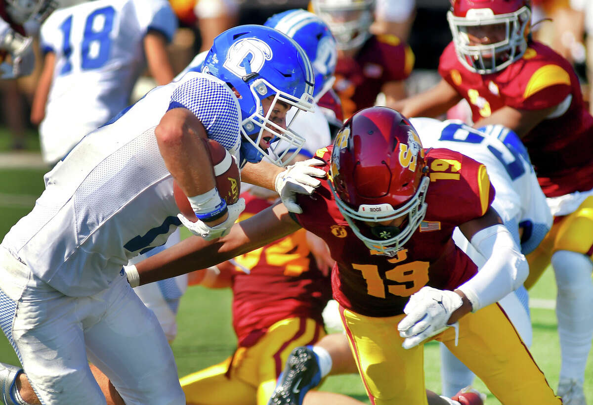 Darien football earns first win in shutout of Bridgeport Central