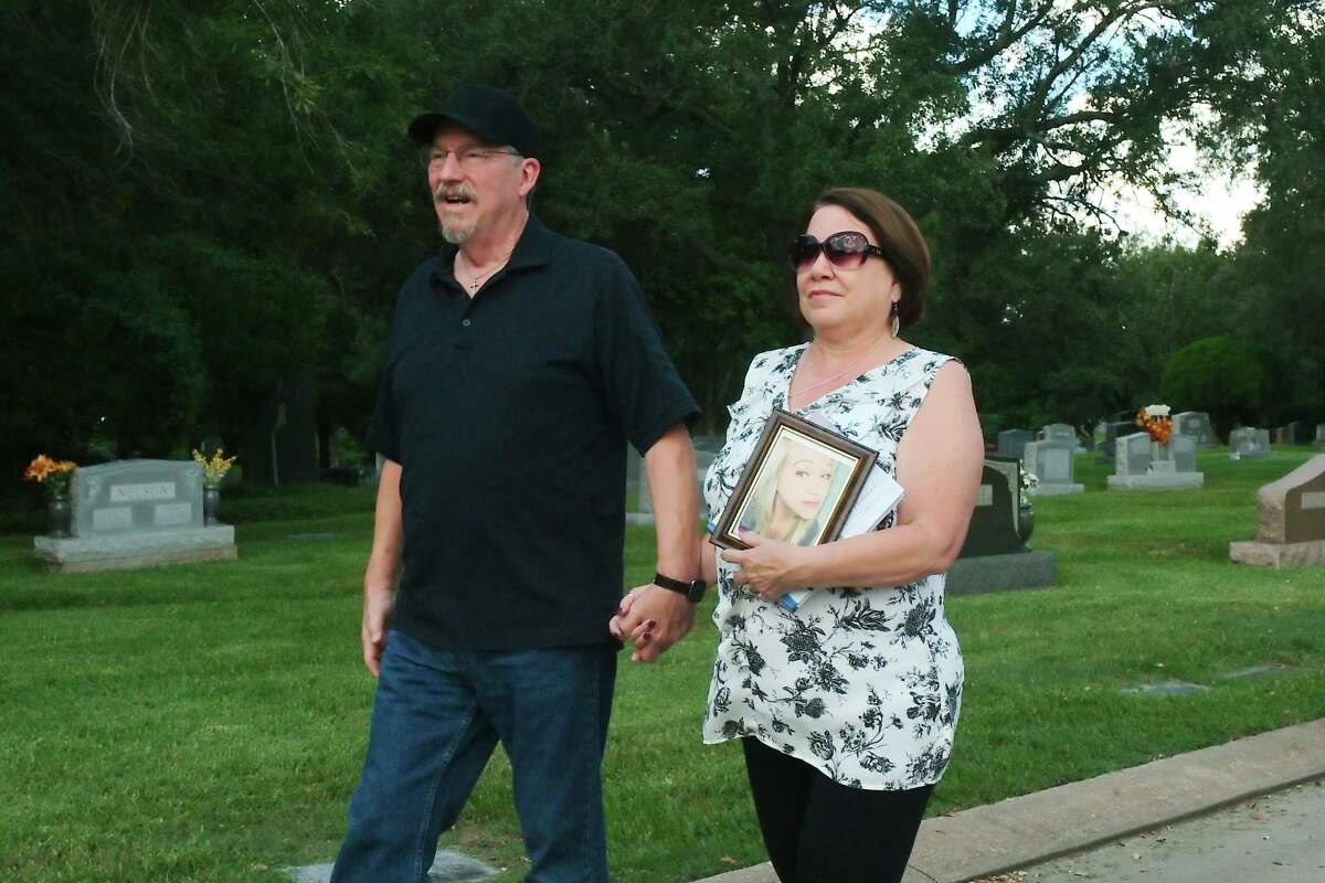 Michael and Shirley Kinchen walk along the planned route of the Savannah Memorial 5K fundraising walk.