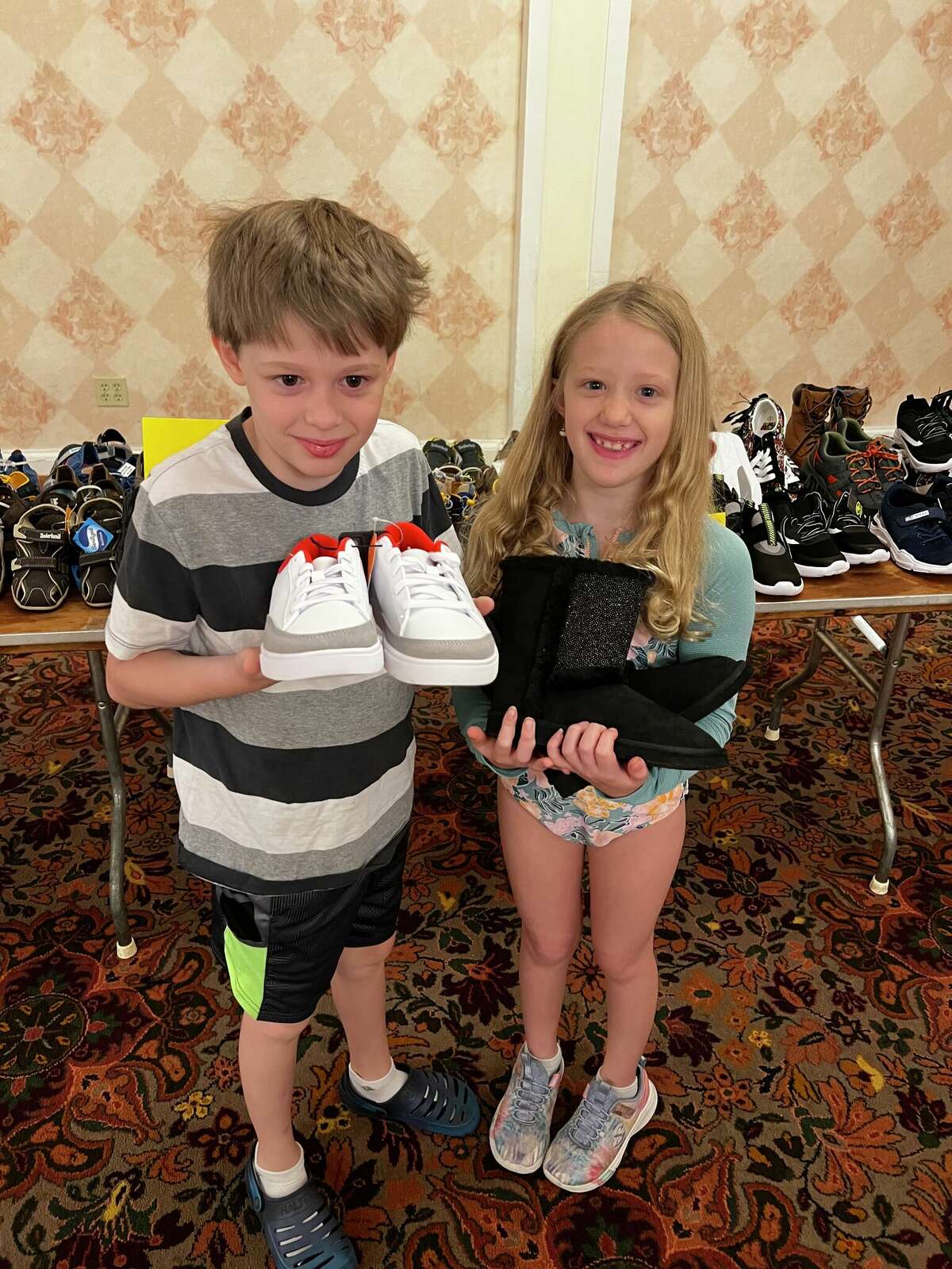 Friendly Hands Food Bank in Torrington gave away more than 500 pairs of sneakers and shoes Sept. 17 to local children, during an event at the Torrington Elks Lodge. 