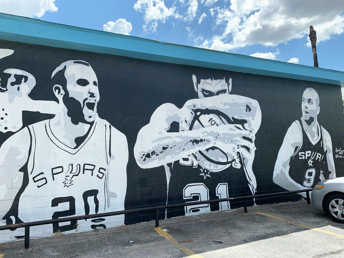 Mural of Spurs greats (l to r) Manu Ginobili, Tim Duncan and Tony Parker by Albert Gonzales on a building at South St. Mary's and Pereida streets.