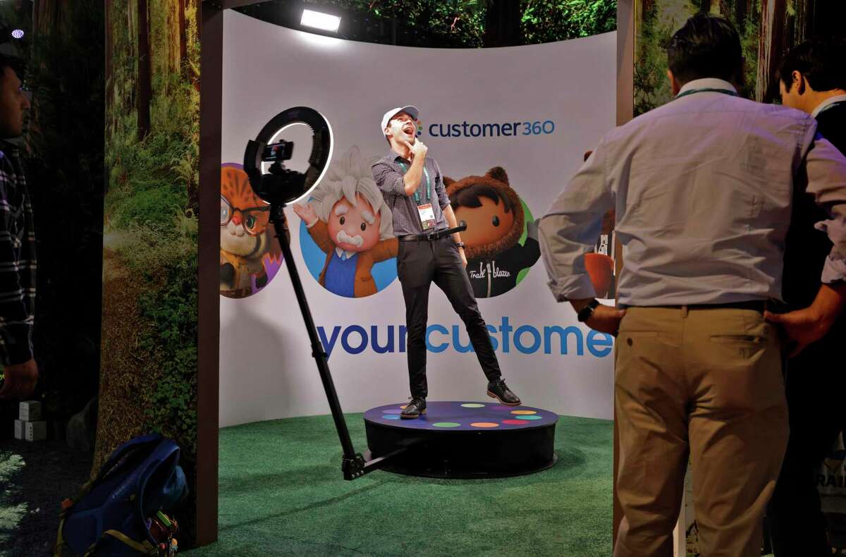 Andrew Herold poses for a 360-degree portrait in the exhibit hall during the Dreamforce 2022 conference in San Francisco.