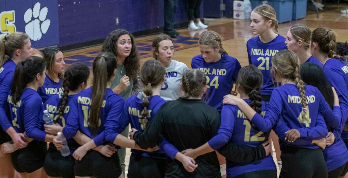 Midland High head coach Bethany Johnstone talks with her players during a timeout against Ft. Stockton 09/20/2002 at Midland High gym. Tim Fischer/Reporter-Telegram