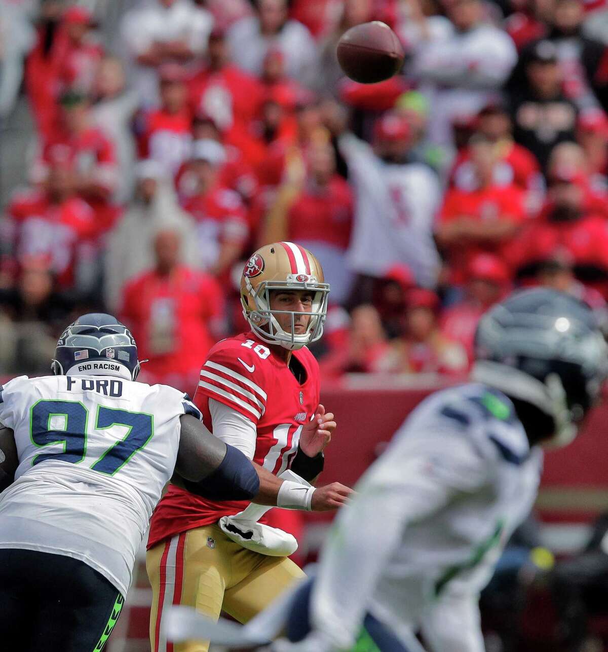 Jimmy Garoppolo (10) throws to Brandon Aiyuk (11) in the second half as the San Francisco 49ers played the Seattle Seahawks at Levi’s Stadium in Santa Clara, Calif., on Sunday, September 18, 2022.
