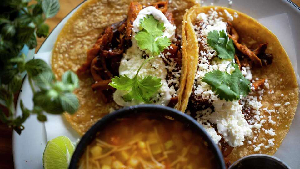 Lion’s Tinga with a Fideo soup bowl at Cochinita & Co. Kitchen.