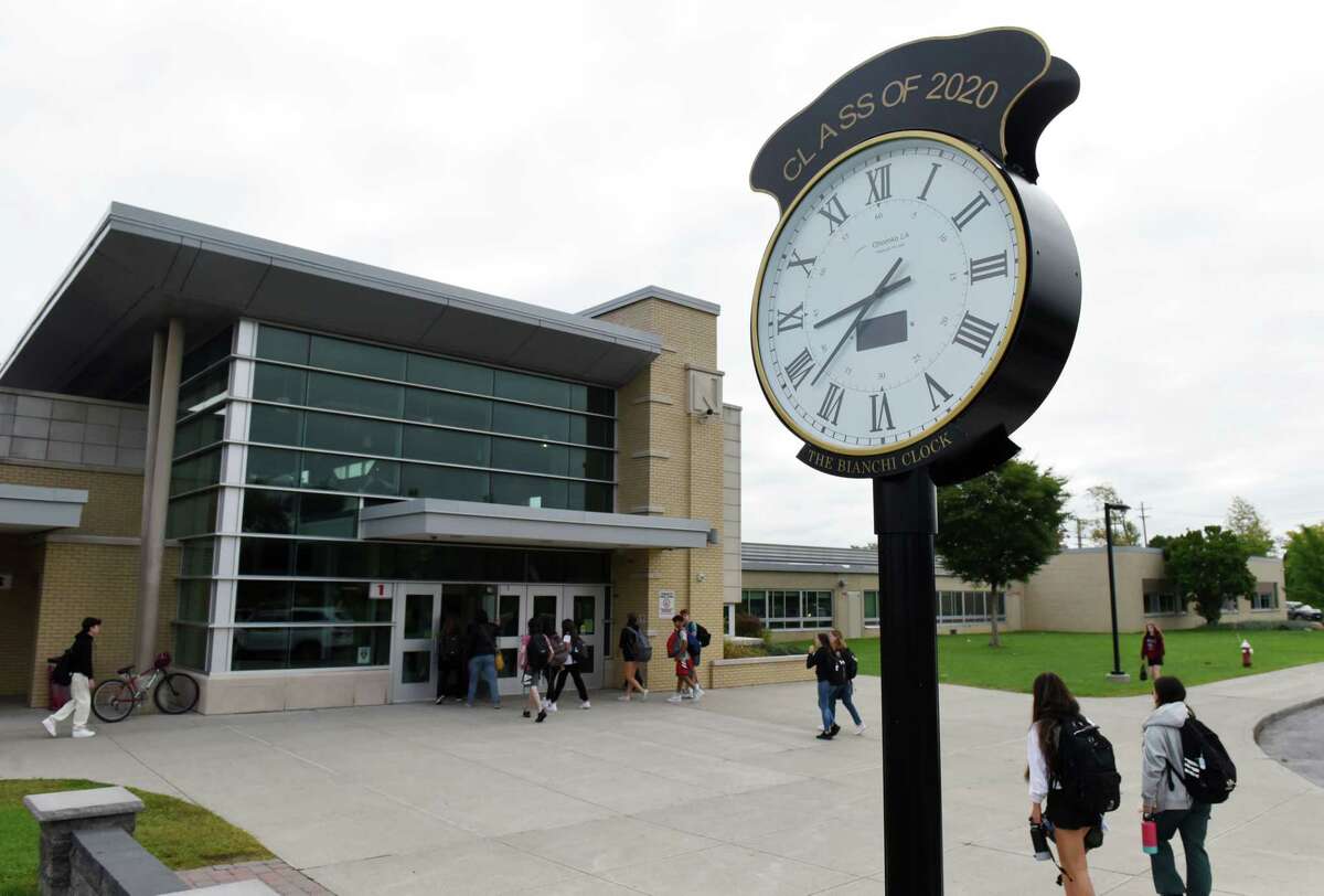 Students arrive for classes at Niskayuna High School for the 8:40 a.m. bell time on Wednesday morning, Sept. 21, 2022, in Niskayuna, N.Y. More high schools are changing times to open later.