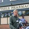 Bob Stefanowski, Republican candidate for governor, unveils his $2 billion tax relief plan Tuesday outside Visels Pharmacy on Dixwell Avenue in New Haven, a few blocks from his childhood home. 