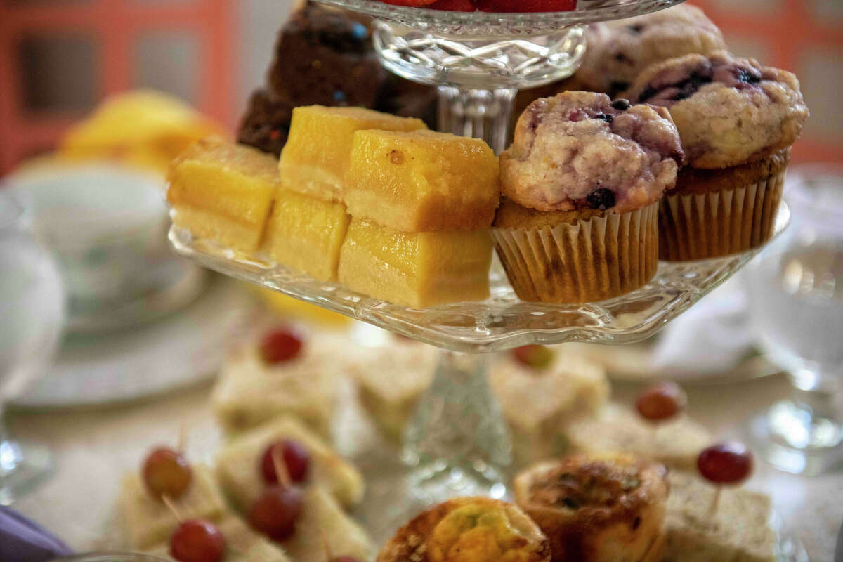 The Bread Box's tea party finger foods assortments includes, grapes, lemon bars, strawberries, blueberry mix cream cheese cookies, pumpkin muffins, chocolate brownies sprinkled with M&Ms, Chicken salad on whole wheat and cucumber sandwiches.