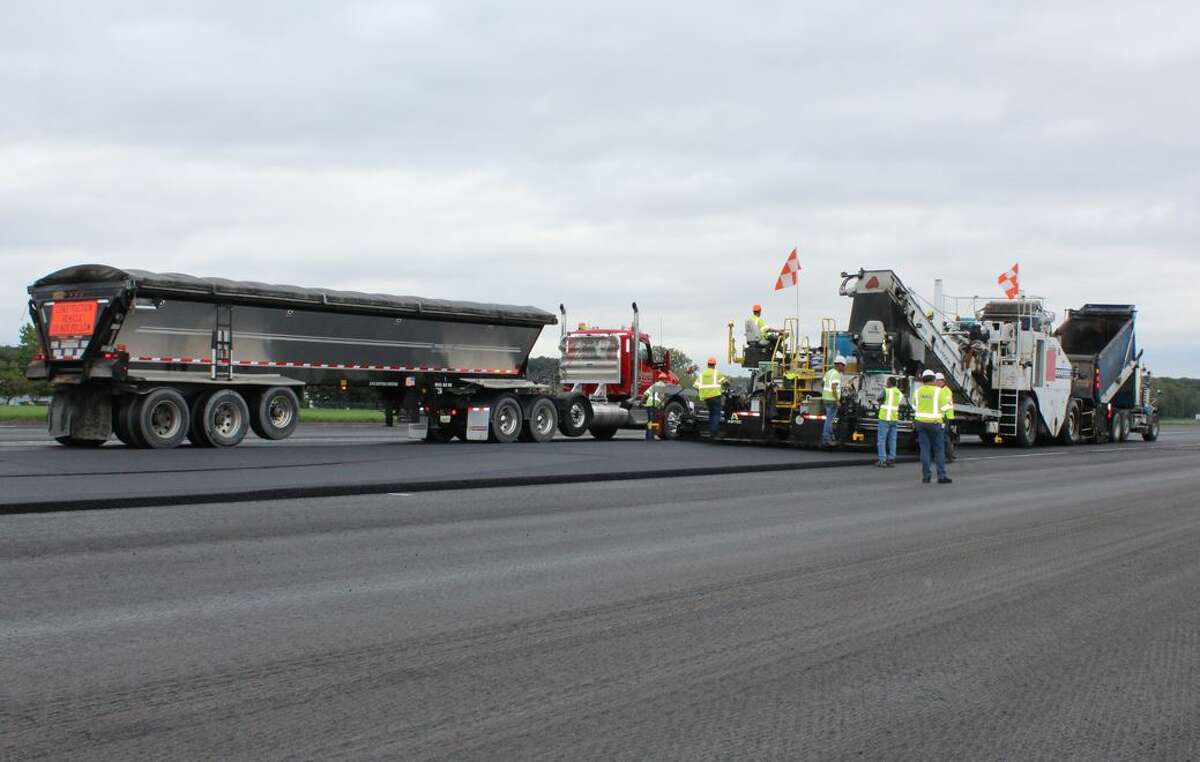 Re-paving crews are hard at work at the Albany International Airport this week.
