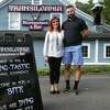 Alina Caldarariu and her husband, Chris, photographed in front of their soon to open Transilvania Restaurant & Bar on Main Street in East Haven on September 21, 2022.