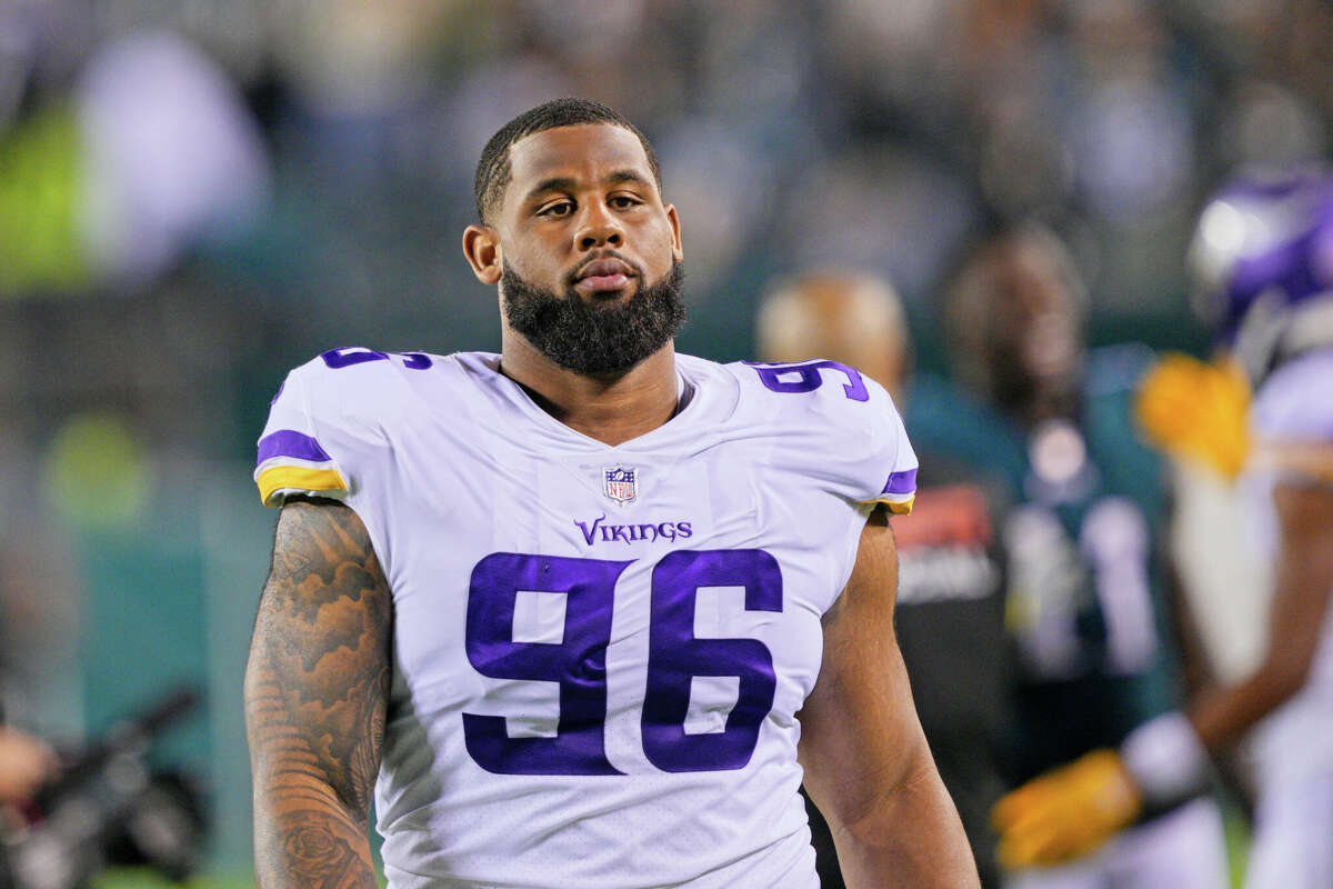 Baltimore Ravens defensive tackle Travis Jones (98) walks off the field  after an NFL football game against the New York Giants Sunday, Oct. 16,  2022, in East Rutherford, N.J. (AP Photo/Adam Hunger