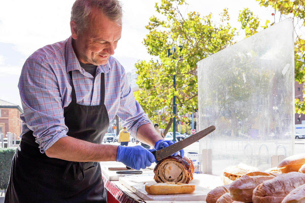 Thomas Odermatt slicing porchetta at the Roli Roti food truck at the Ferry Building in San Francisco on Sept.
/p
p20, 2022.