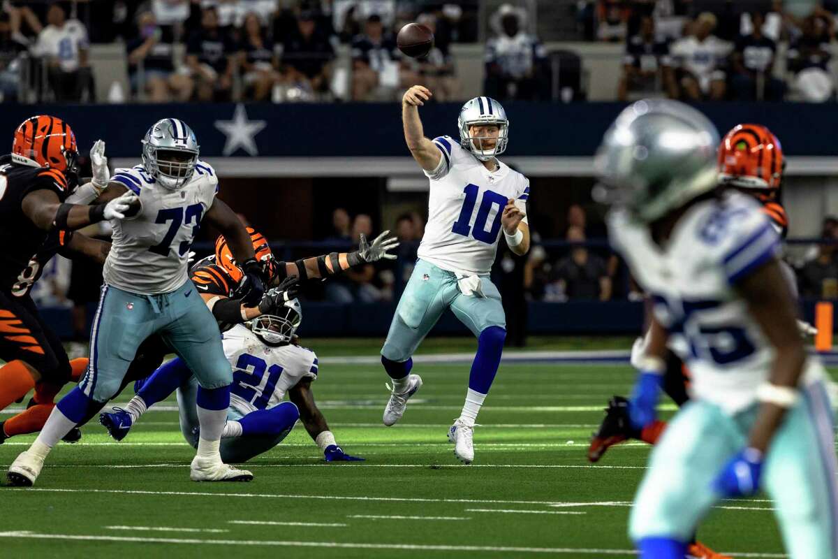 Dallas Cowboys quarterback Cooper Rush (10) throws during an NFL football game against the Cincinnati Bengals, Sunday, Sept. 18, 2022, in Arlington, Texas. Dallas won 20-17.