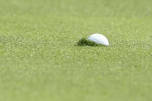 Isaac Anderson's shot creates its own hole on a truly soft green