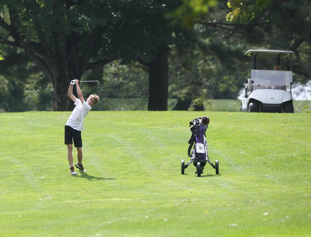 Routt's Isaac Anderson hits an approach shot during Monday's Rocket Invite at the Jacksonville Country Club Golf Course.