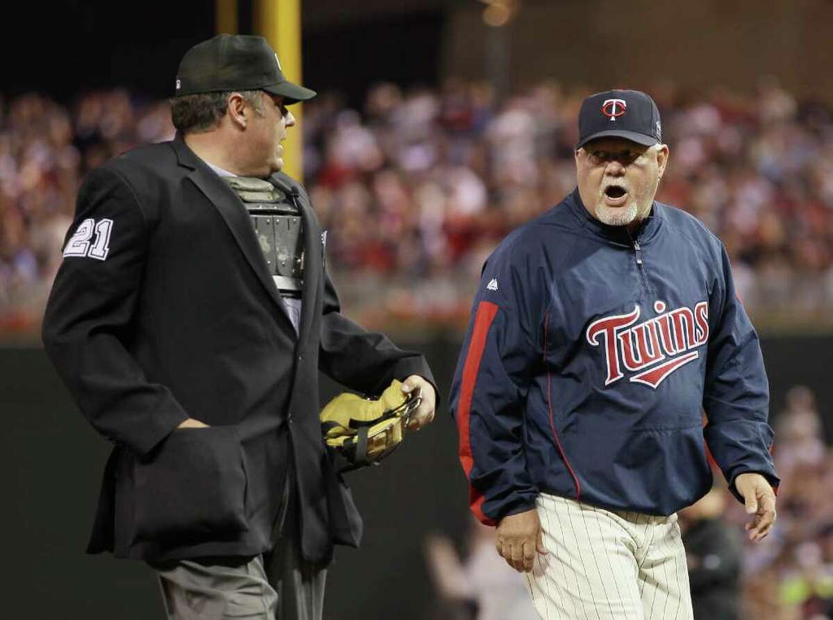 MINNEAPOLIS - OCTOBER 07: Manager Ron Gardenhire #35 of the Minnesota Twins is ejected from the game by Hunter Wedelstedt in the seventh inning against the New York Yankees during game two of the ALDS on October 7, 2010 at Target Field in Minneapolis, Minnesota. (Photo by Elsa/Getty Images) *** Local Caption *** Ron Gardenhire;Hunter Wedelstedt