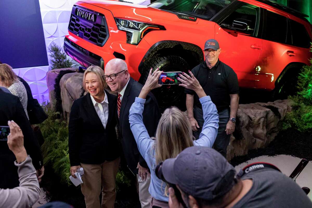 Toyota Motor Manufacturing Texas Vice President of Manufacturing Susann Kazunas, left, and San Antonio Manufacturers Association CEO Dan Yoxall pose for a photo during the automaker’s ceremony for the launch of the redesigned 2023 Sequoia SUV.