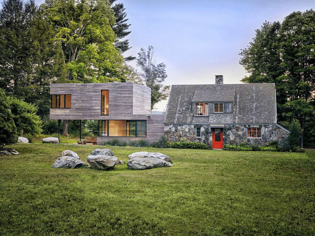 Perhaps only an architect would see the potential to join a weathered stone cottage with a new, ultra-modern addition. The result is a property with distinct living spaces for two families, plus a communal area in the middle.