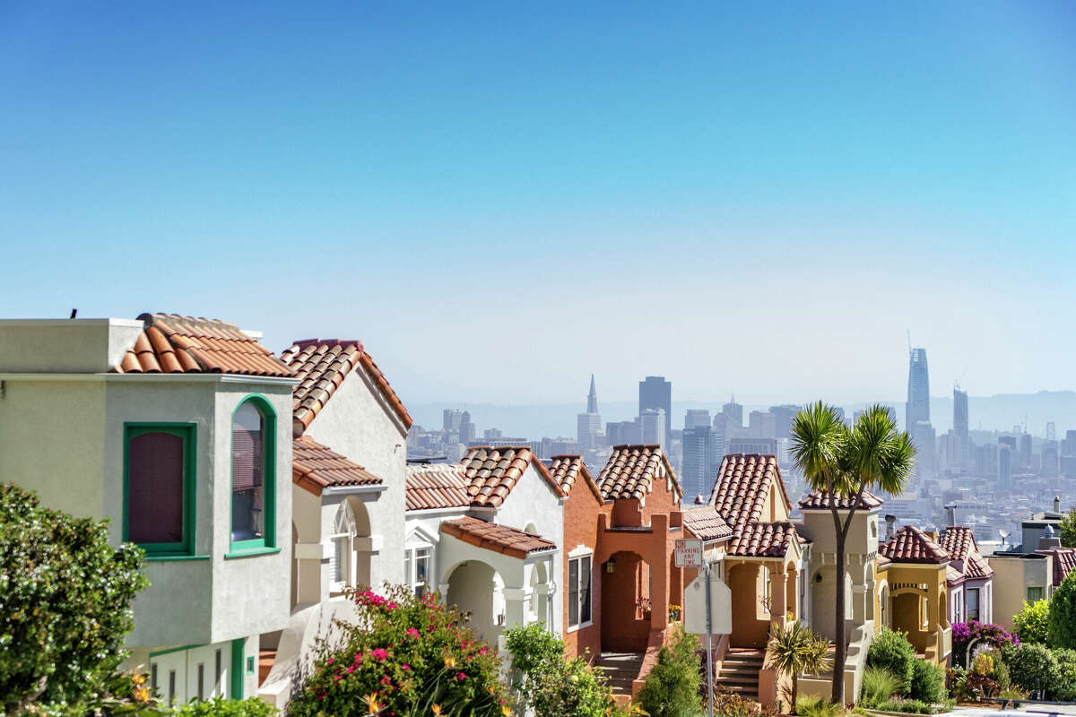 Houses in San Francisco overlook the city's skyline. More home buyers here were looking to relocate than any other metro in July and August, a new Redfin report said.