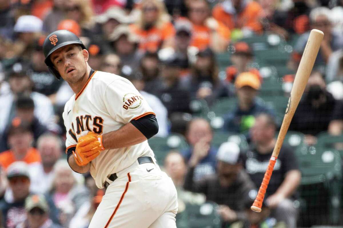 San Francisco Giants’ Jason Vosler tosses the bat after being walked during the fourth inning of a MLB baseball game against the Chicago White Sox in San Francisco, Calif. Saturday, July 2, 2022. The White Sox defeated the Giants 5-3.