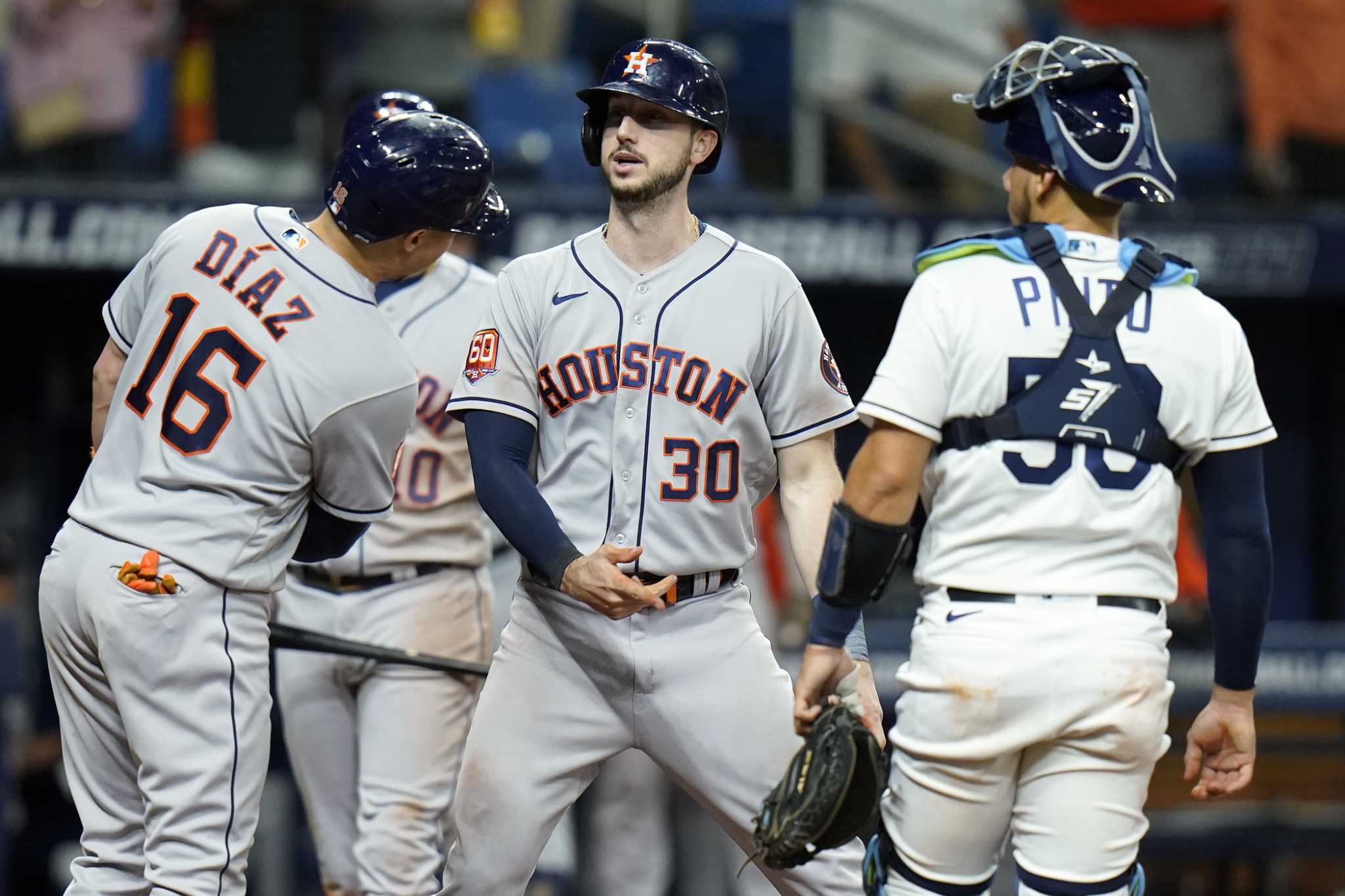 Houston Astros fans enthusiastic as Kyle Tucker reaches up and