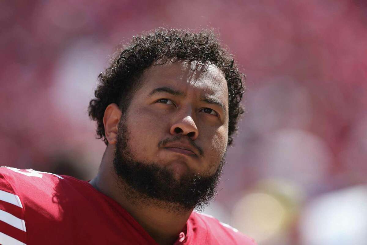 San Francisco 49ers guard Aaron Banks (65) looks on from the sideline during an NFL football game against the Seattle Seahawks, Sunday, Sept. 18, 2022 in Santa Clara, Calif. (AP Photo/Lachlan Cunningham)
