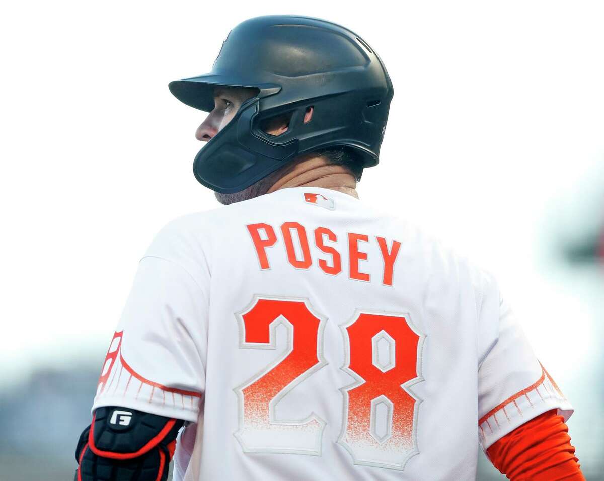 Buster Posey hit .304 with 18 home runs in 2021, his 12th and final season with the Giants.