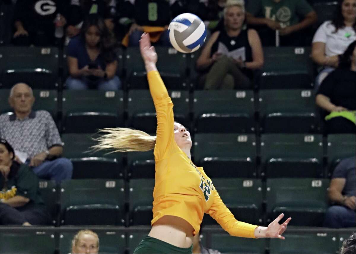 Midland College's Petra Fernandez records kill in Wednesday's match versus Western Texas College at Chaparral Center.