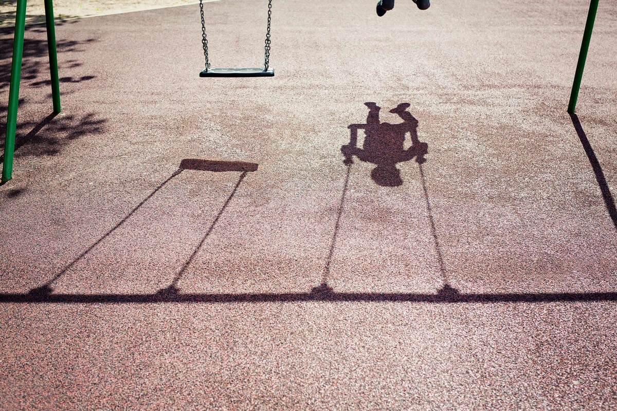 STOCK IMAGE Swing set at a playground