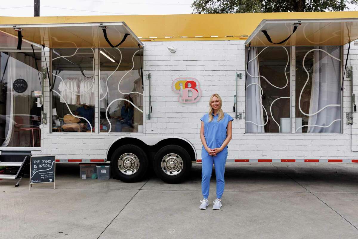 Jennifer Newell — founder and CEO of Betty’s Co., a mobile health care clinic operator — stands in front of the company’s 28-foot-long trailer, which was parked outside Avalon Place Apartments near the University of Texas at San Antonio on Aug. 30. The company’s mission is to serve patients ages 13 to 45 seeking gynecology, mental health and wellness care on the go.