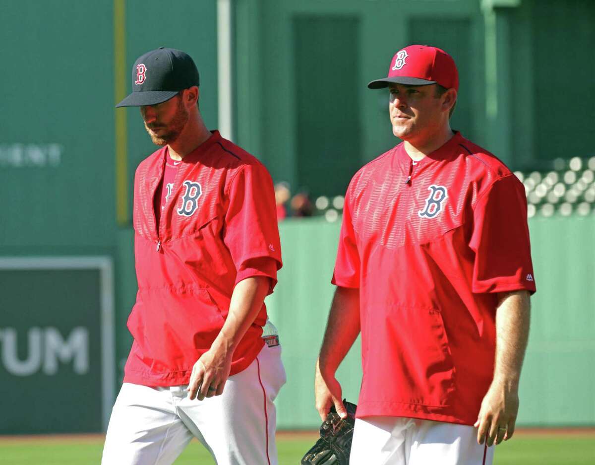 (Boston, MA 07/05/16) Pitcher Tommy Layne walks in from the outfield with Brian Bannister before the Red Sox vs. Rangers game at Fenway Park. Tuesday, July 5, 2016. Staff photo by John Wilcox. (Photo by John Wilcox/MediaNews Group/Boston Herald via Getty Images)