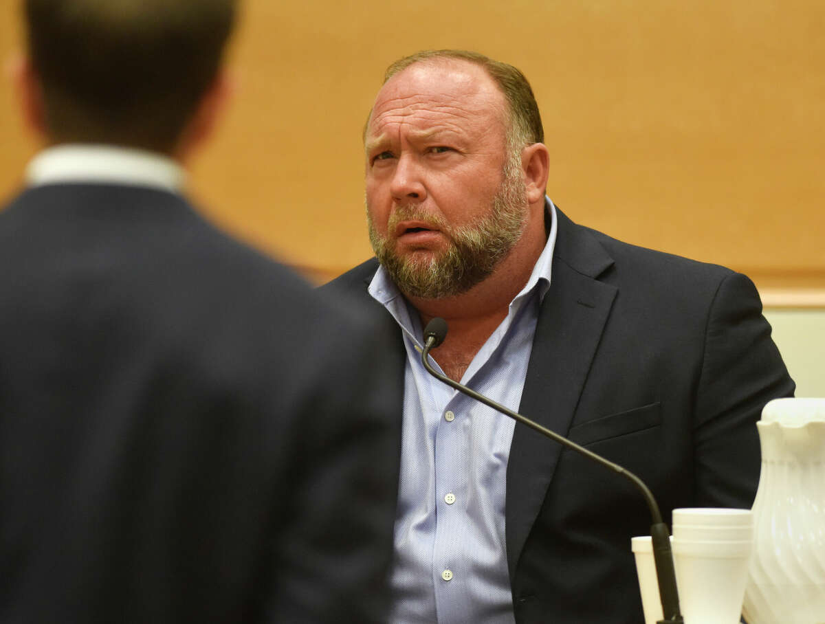 Infowars founder Alex Jones is questioned by plaintiff's attorney Chris Mattei during testimony at the Sandy Hook defamation damages trial at Connecticut Superior Court in Waterbury, Conn. Thursday, Sept. 22, 2022.